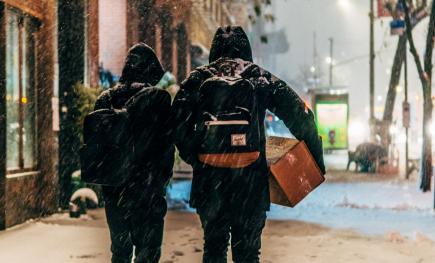 people walking in snow